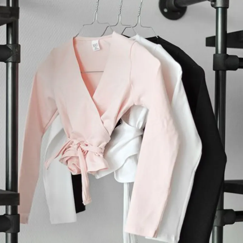 crossover_rosa_overdel_ti_1.webp Dansebutikken Cross-over rosa overdel til piger Bloch>Børn Ballet Toppe Børn