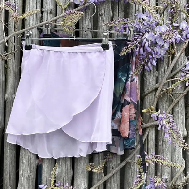 lyselilla_chiffon_skirt_p_1.webp Dansebutikken Lyselilla chiffon skirt piger Capezio>Børn Underdele Piger | Gymnastikkjole Piger